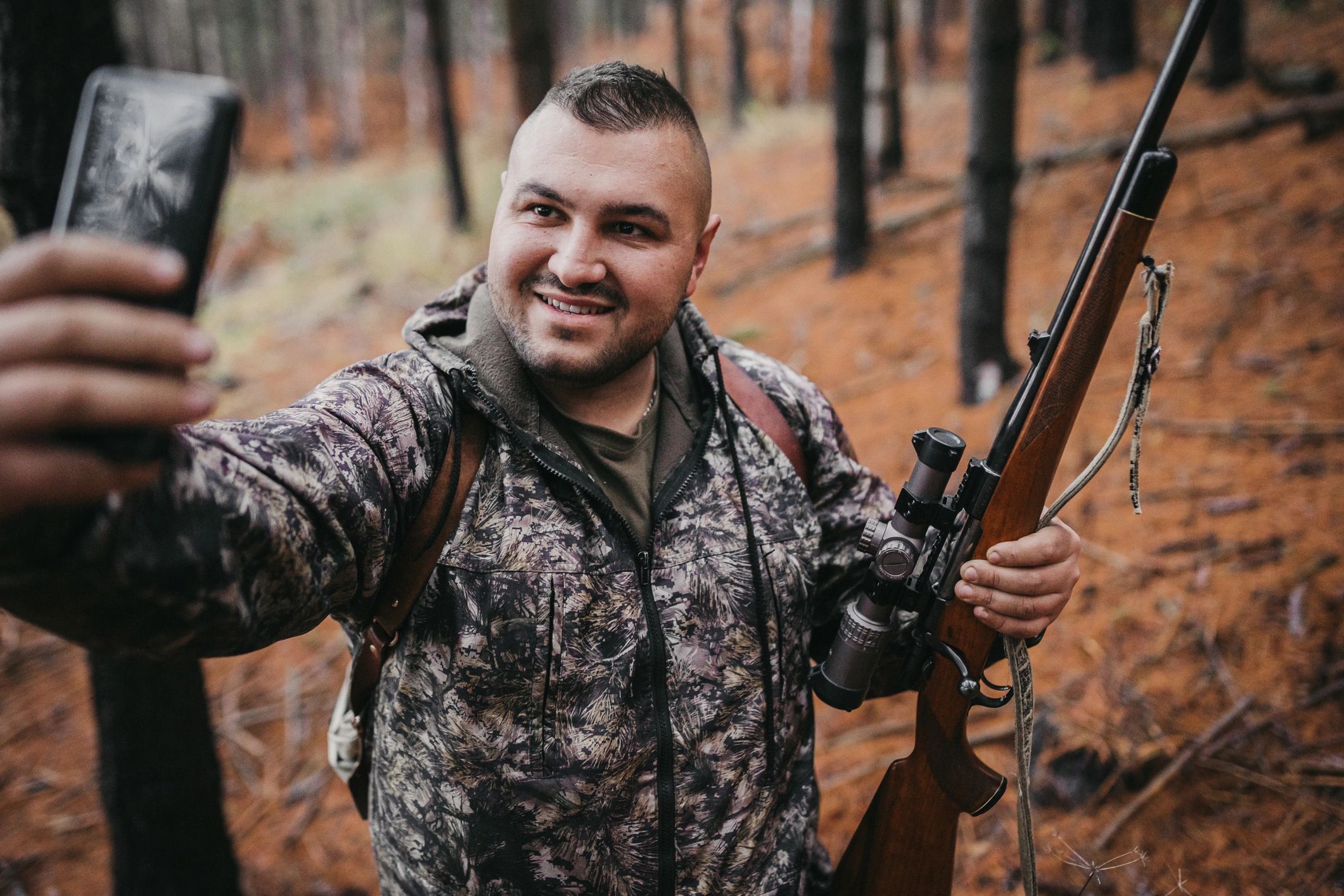happy customer outdoors hunting